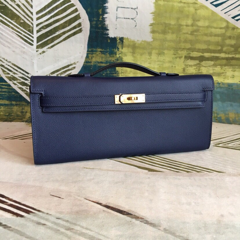 Deep Royal Navy Elongated Twist-Lock Handheld Clutch With Slim Top Grip Handle And Precise Stitch Detailing