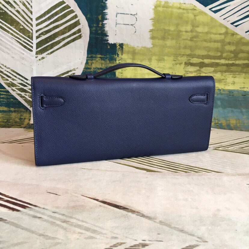Deep Royal Navy Elongated Twist-Lock Handheld Clutch With Slim Top Grip Handle And Precise Stitch Detailing