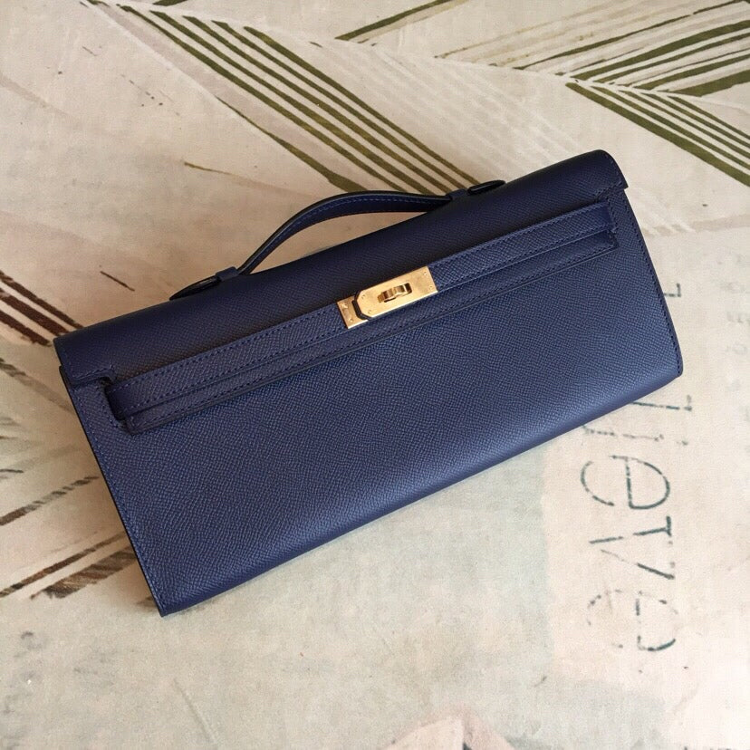 Deep Royal Navy Elongated Twist-Lock Handheld Clutch With Slim Top Grip Handle And Precise Stitch Detailing
