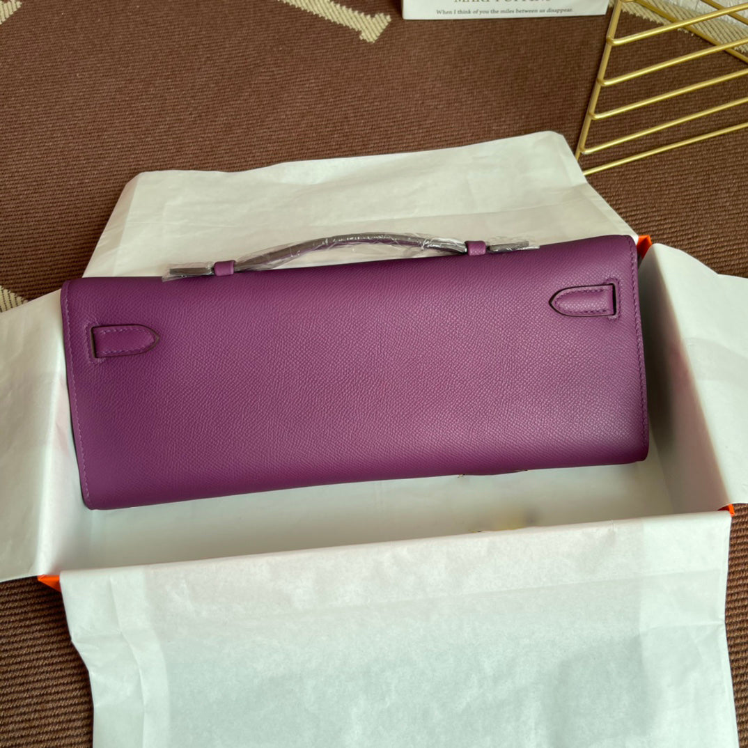 Anemone Purple Elongated Handheld Clutch With Polished Golden Twist-Lock Hardware And Slim Top Grip Handle