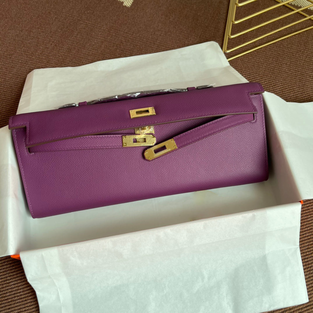 Anemone Purple Elongated Handheld Clutch With Polished Golden Twist-Lock Hardware And Slim Top Grip Handle